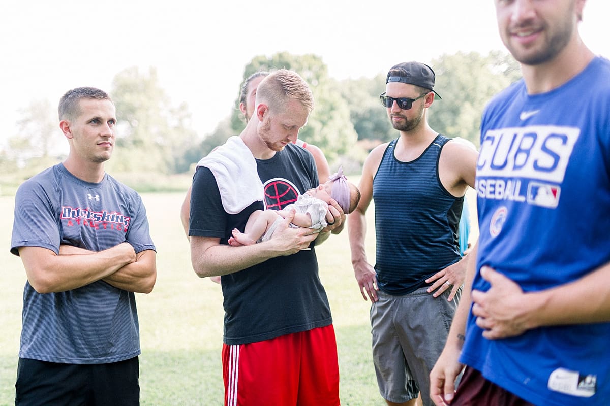 Arielle Peters Photography | Uncles meeting their newborn baby niece.