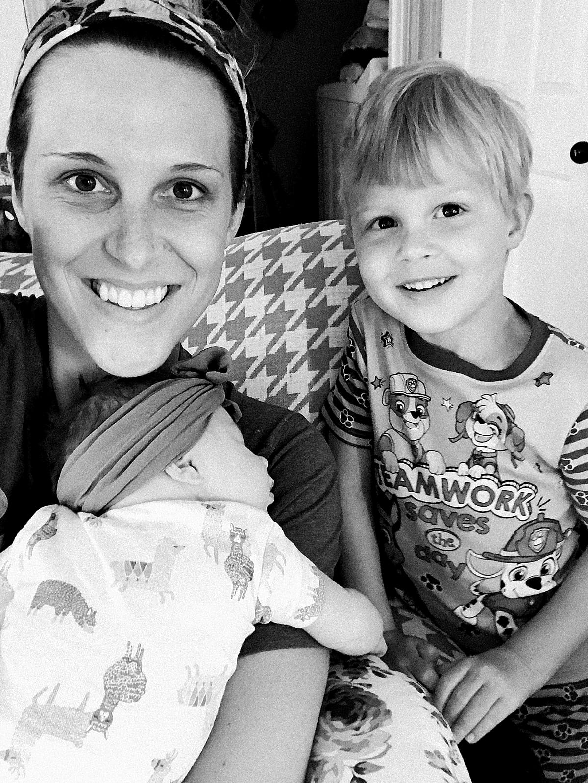 Arielle Peters Photography | Mom with her newborn baby girl and son. 