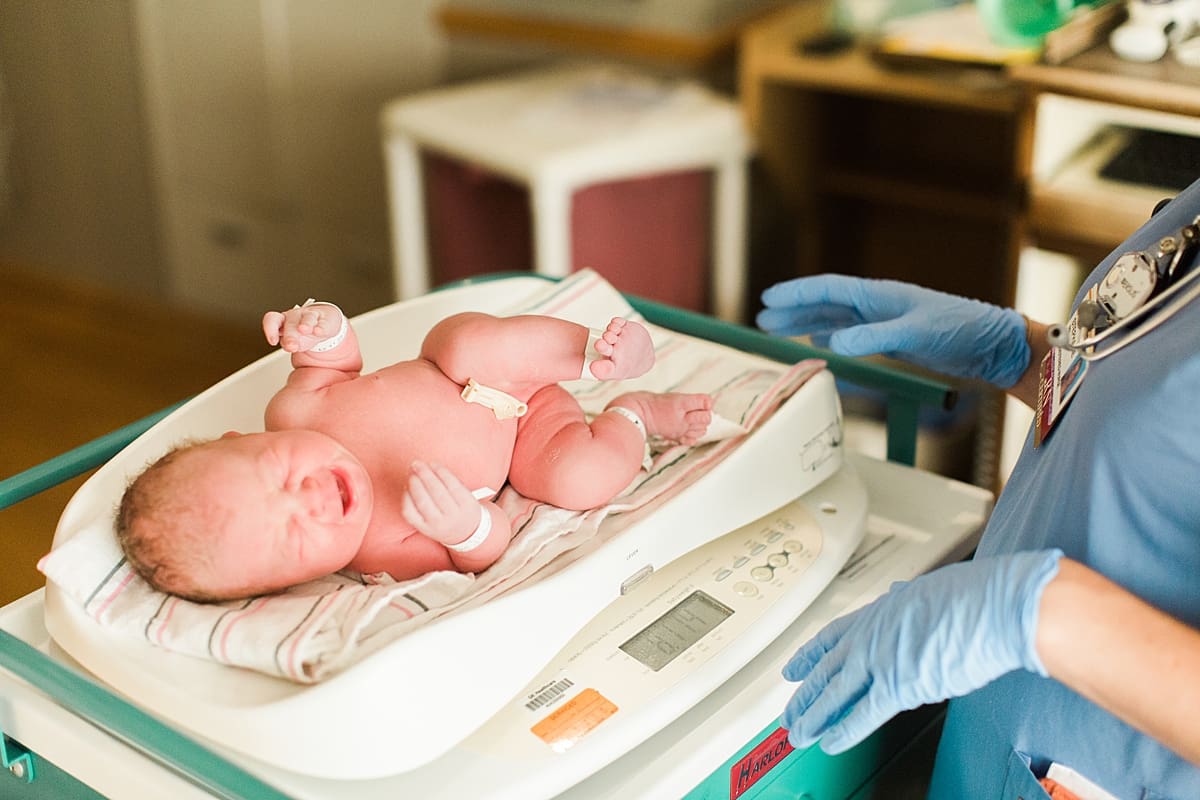 Arielle Peters Photography | Newborn baby crying in the hospital.