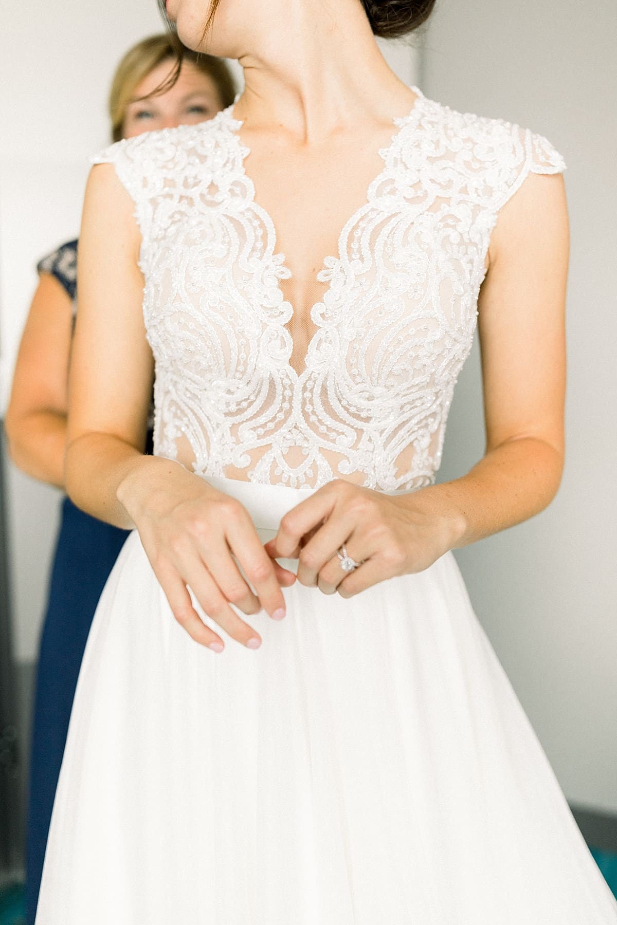 Arielle Peters Photography | Bride on her wedding gown at The Blue Heron at Blackthorn in South Bend, Indiana on wedding day.