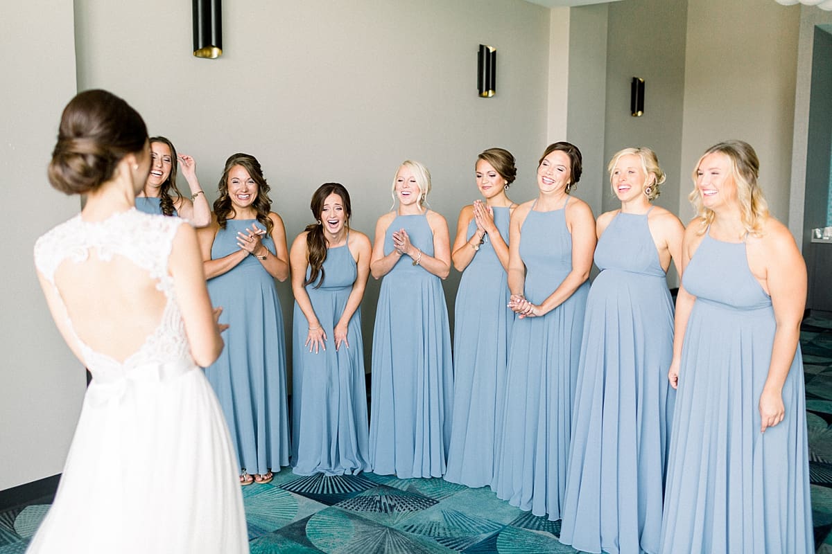 Arielle Peters Photography | Bridesmaids having first reveal of the bride on wedding day at The Blue Heron at Blackthorn in South Bend, Indiana on wedding day.