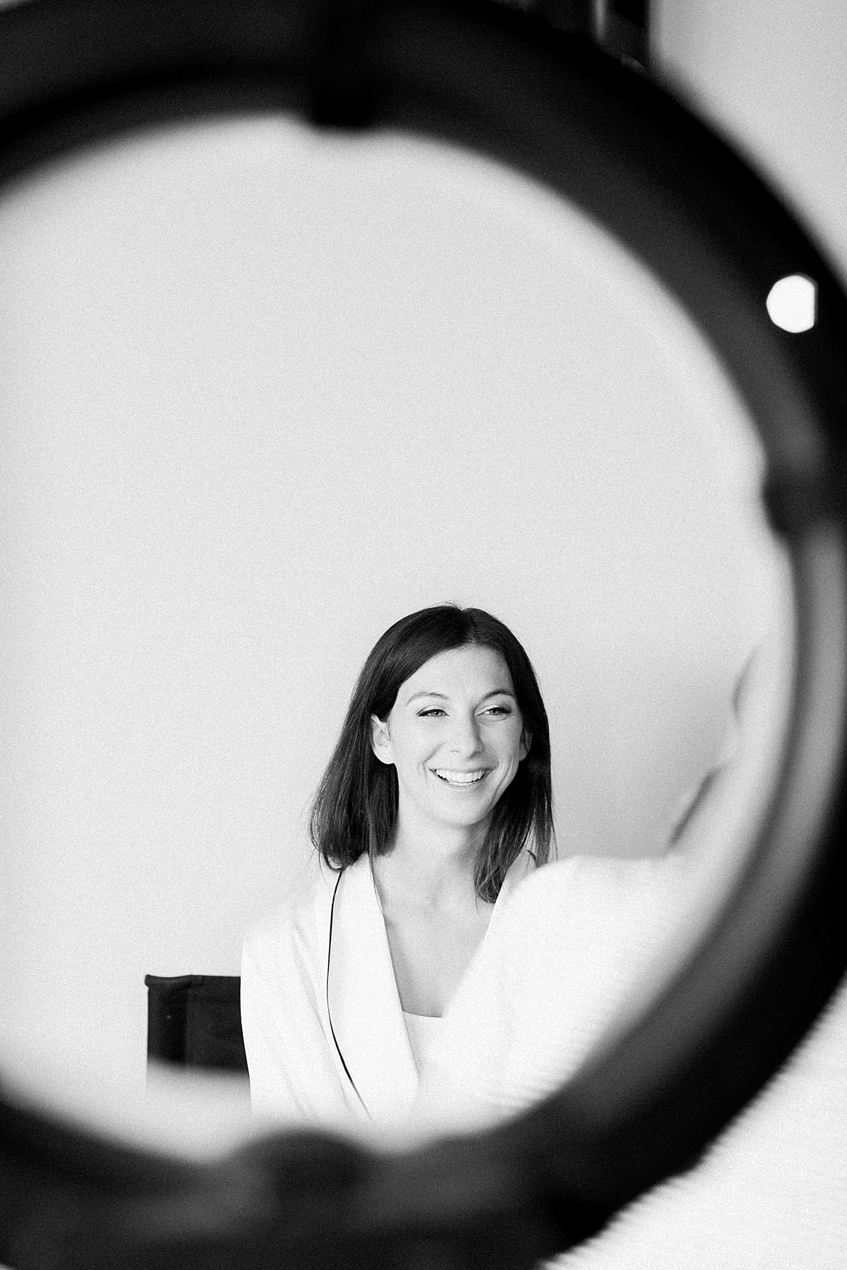 Arielle Peters Photography | Bride getting her makeup done on her wedding day at The Blue Heron at Blackthorn in South Bend, Indiana on wedding day.