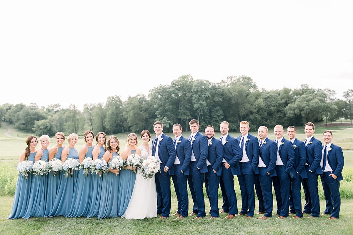 Arielle Peters Photography | Wedding party lined up outside at The Blue Heron at Blackthorn in South Bend, Indiana on wedding day.