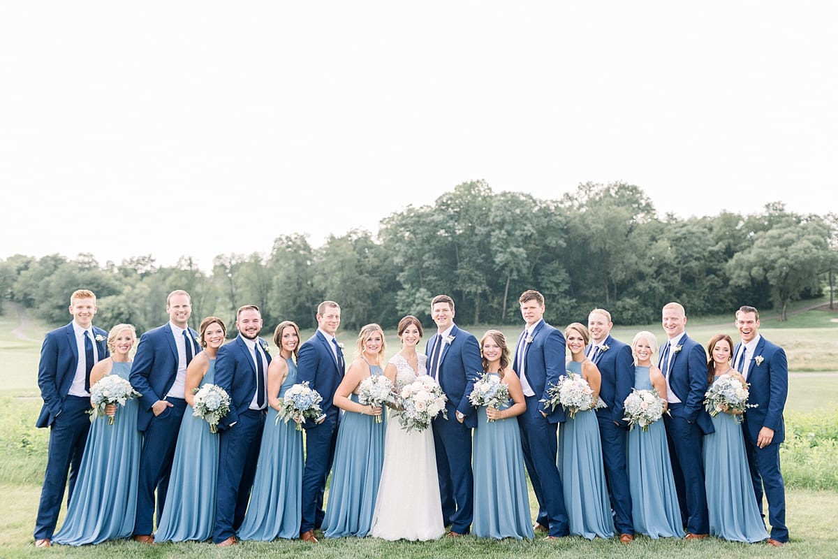 Arielle Peters Photography | Wedding party lined up outside at The Blue Heron at Blackthorn in South Bend, Indiana on wedding day.