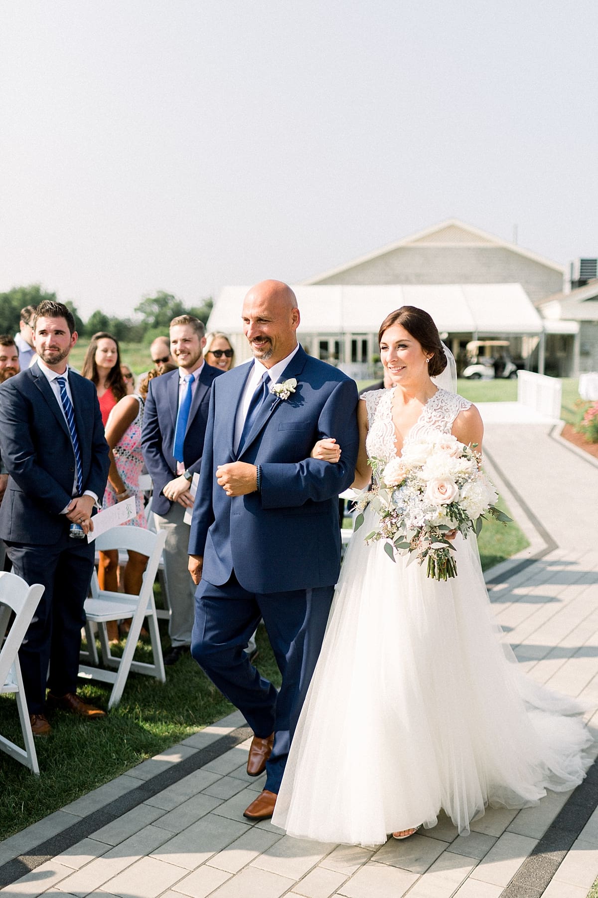 Arielle Peters Photography | Father of the bride walking the bride down the aisle at The Blue Heron at Blackthorn in South Bend, Indiana on wedding day.