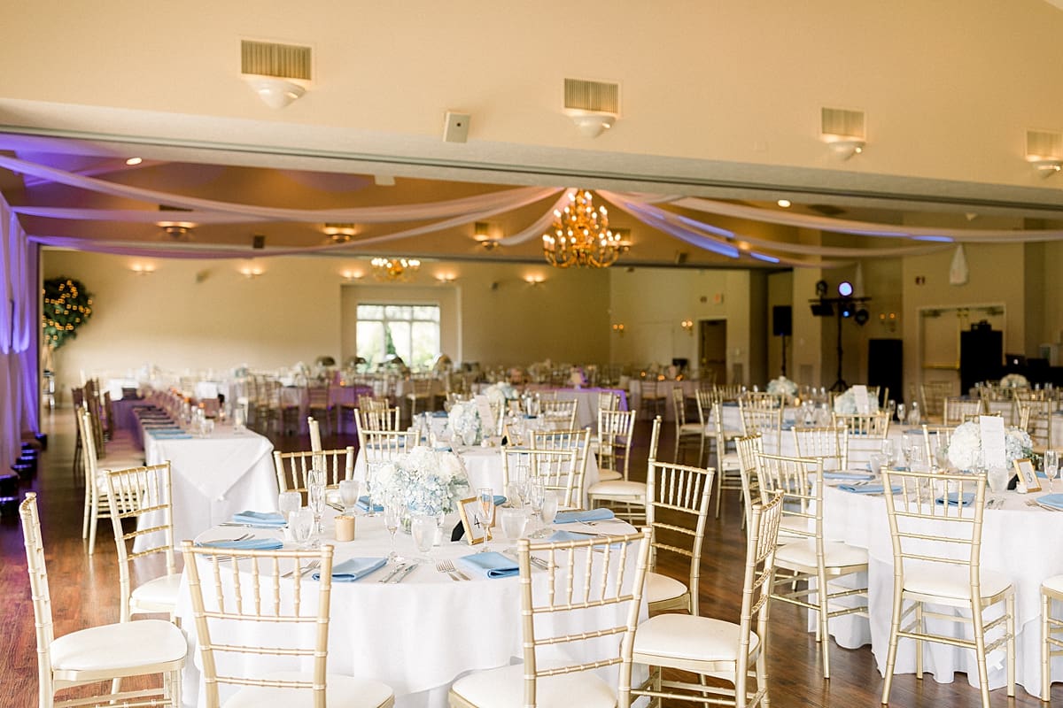 Arielle Peters Photography | Wedding reception table settings and floral arrangements at The Blue Heron at Blackthorn in South Bend, Indiana on wedding day.