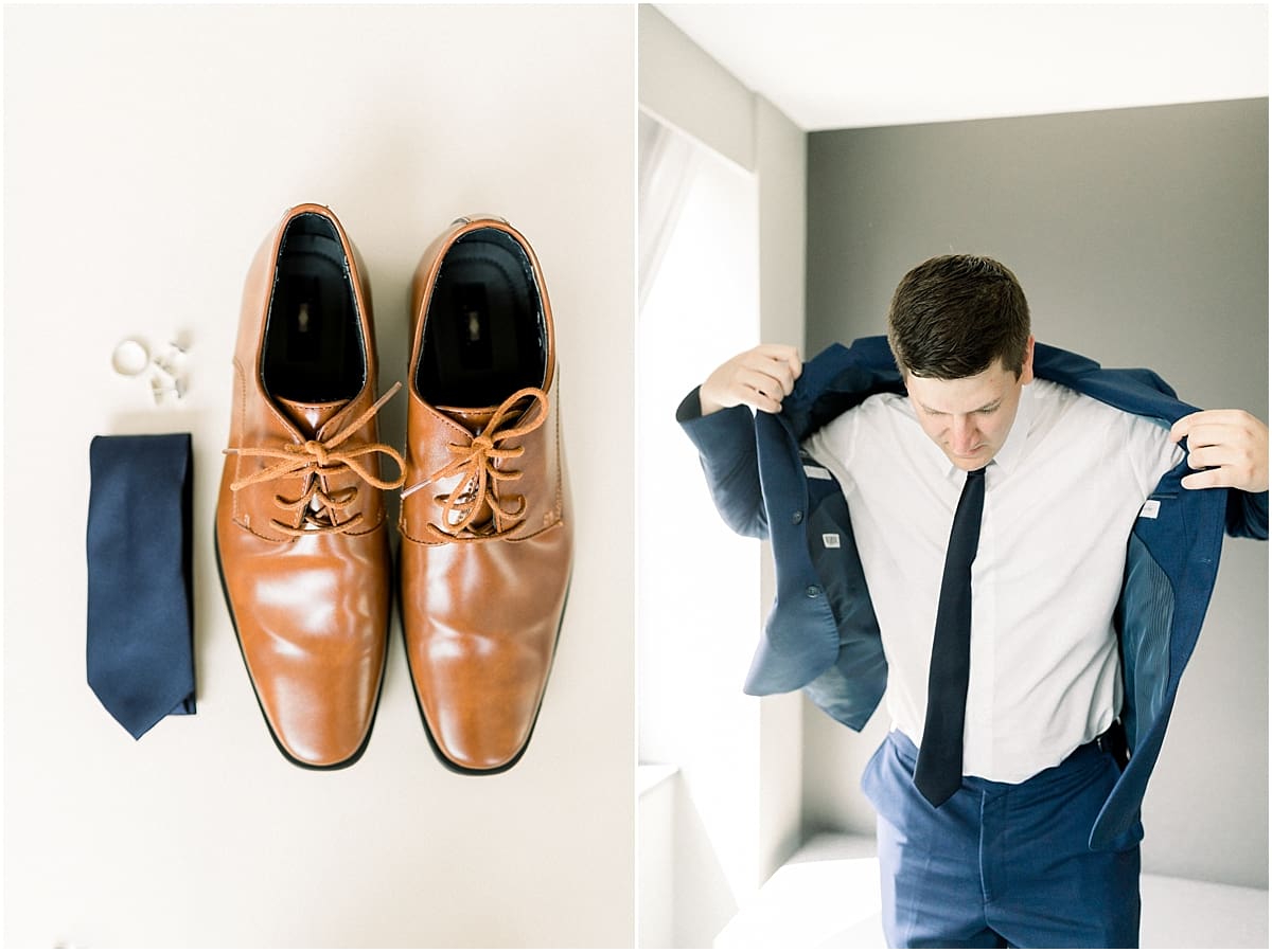 Arielle Peters Photography | Groom putting on suit jacket on wedding day at The Blue Heron at Blackthorn in South Bend, Indiana on wedding day.