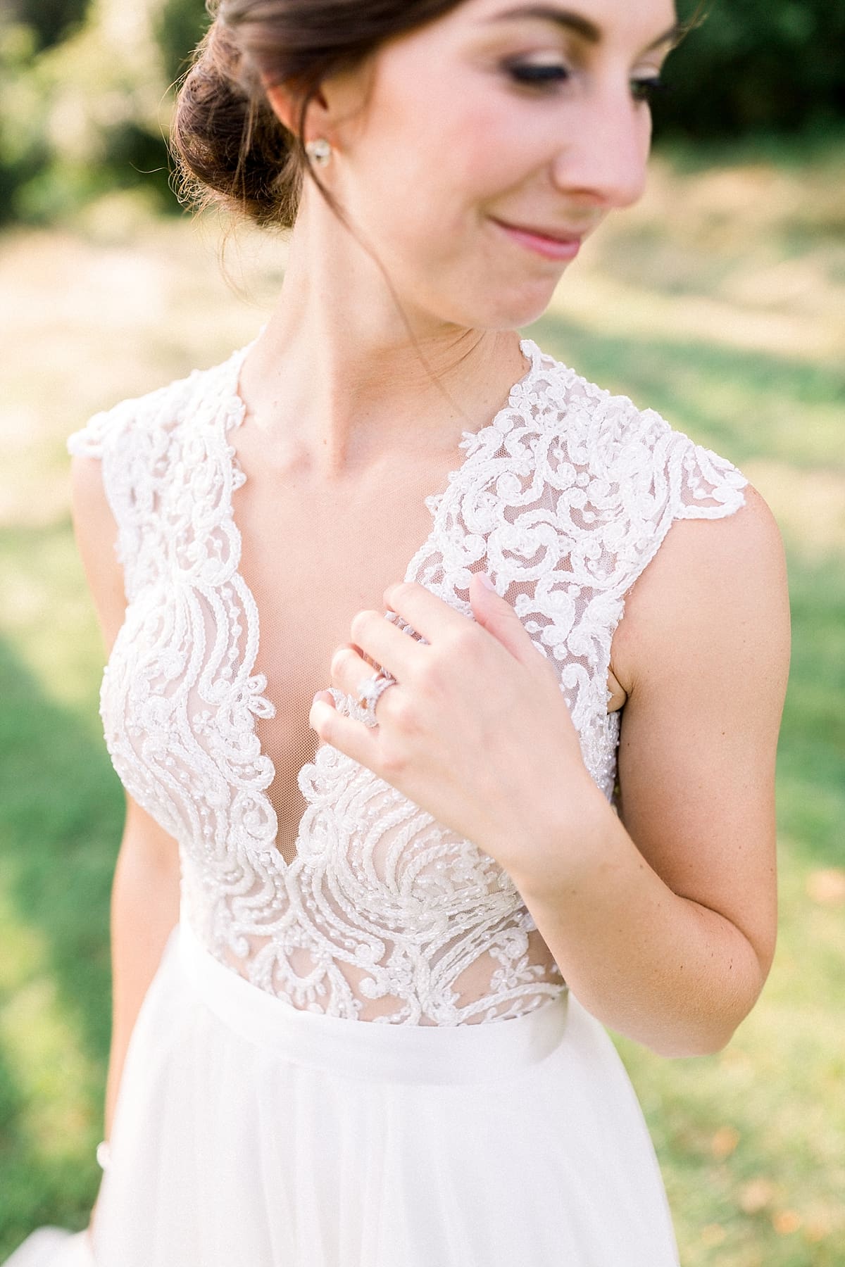 Arielle Peters Photography | Close up of bride in her gown outside at The Blue Heron at Blackthorn in South Bend, Indiana on wedding day.