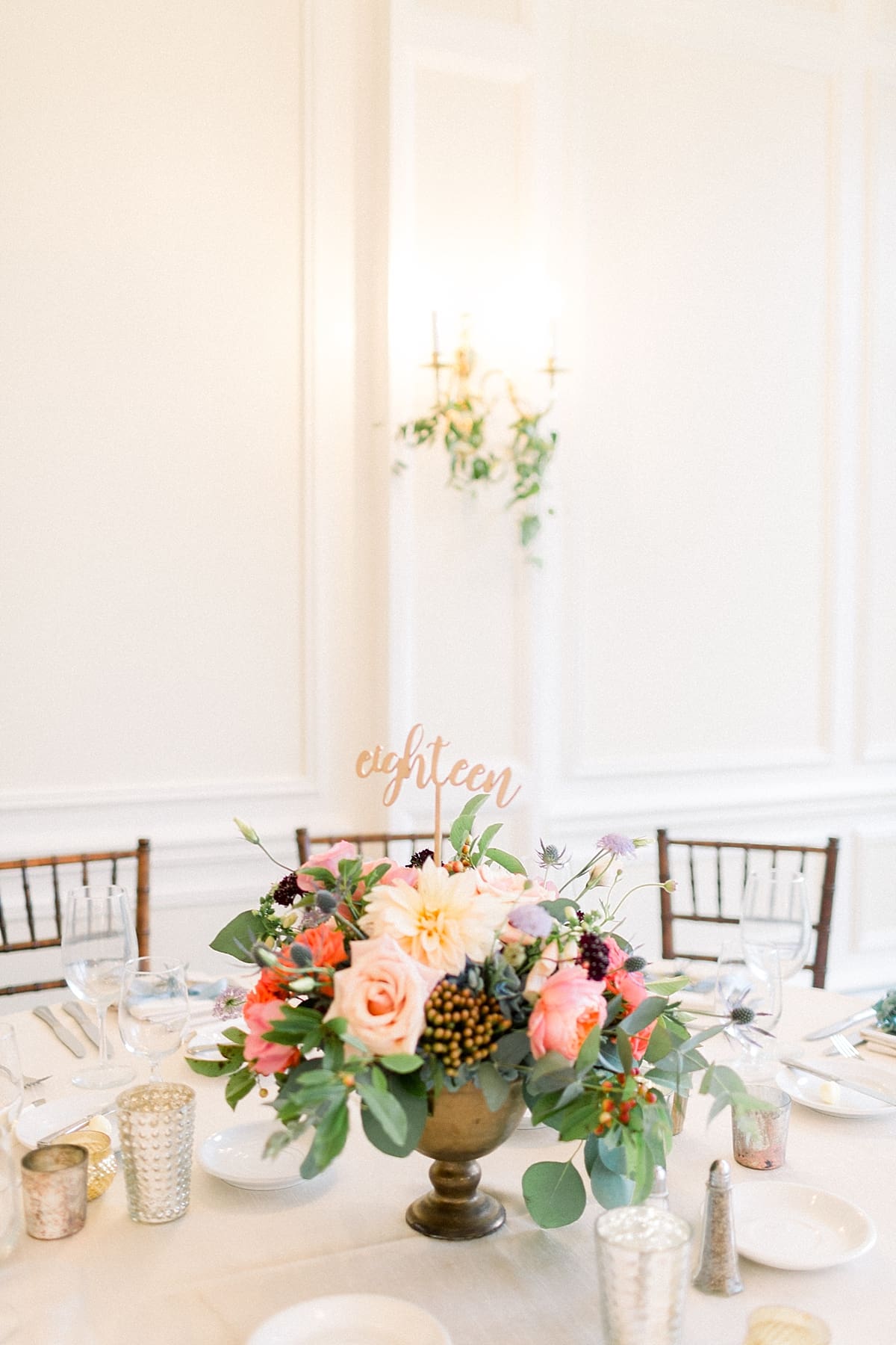 Arielle Peters Photography | Wedding reception table settings and floral arrangements at Sycamore Hills Golf Club in Fort Wayne, Indiana on wedding day.