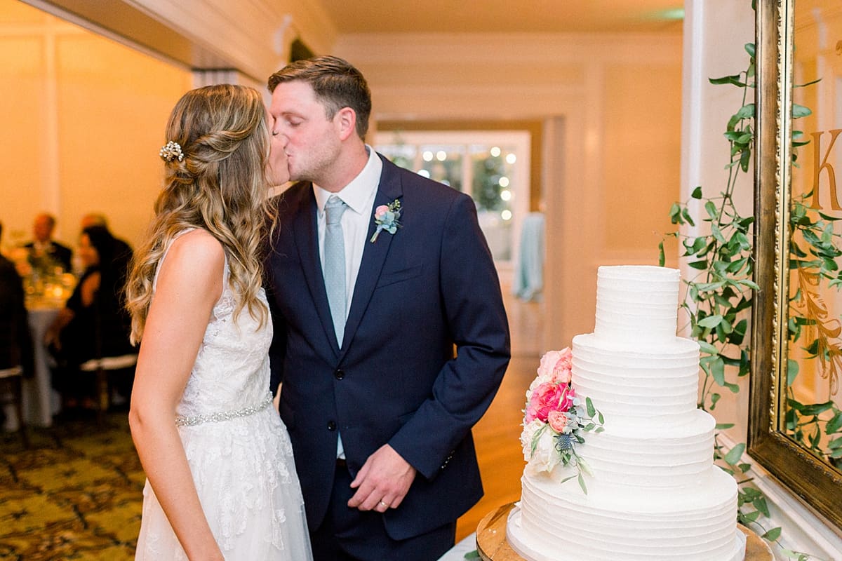 Arielle Peters Photography | Bride and groom kissing at wedding reception at Sycamore Hills Golf Club in Fort Wayne, Indiana on wedding day.