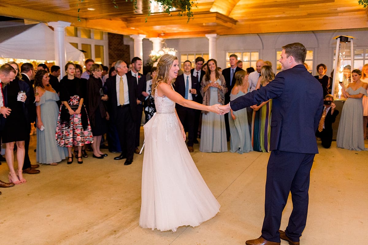 Arielle Peters Photography | Bride and groom sharing first dance at wedding reception at Sycamore Hills Golf Club in Fort Wayne, Indiana on wedding day.