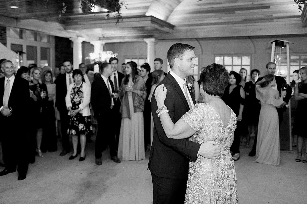 Arielle Peters Photography | Mother of the groom and groom sharing a dance at wedding reception at Sycamore Hills Golf Club in Fort Wayne, Indiana on wedding day.