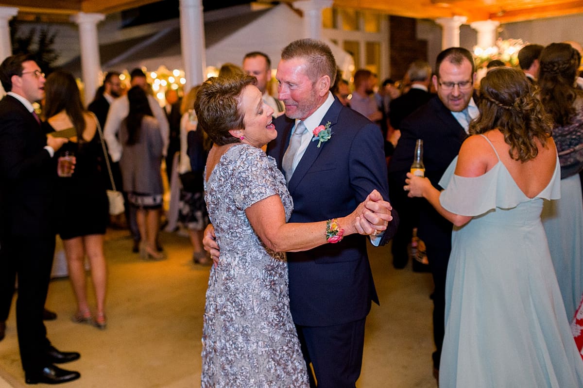 Arielle Peters Photography | Wedding guests dancing at wedding reception at Sycamore Hills Golf Club in Fort Wayne, Indiana on wedding day.
