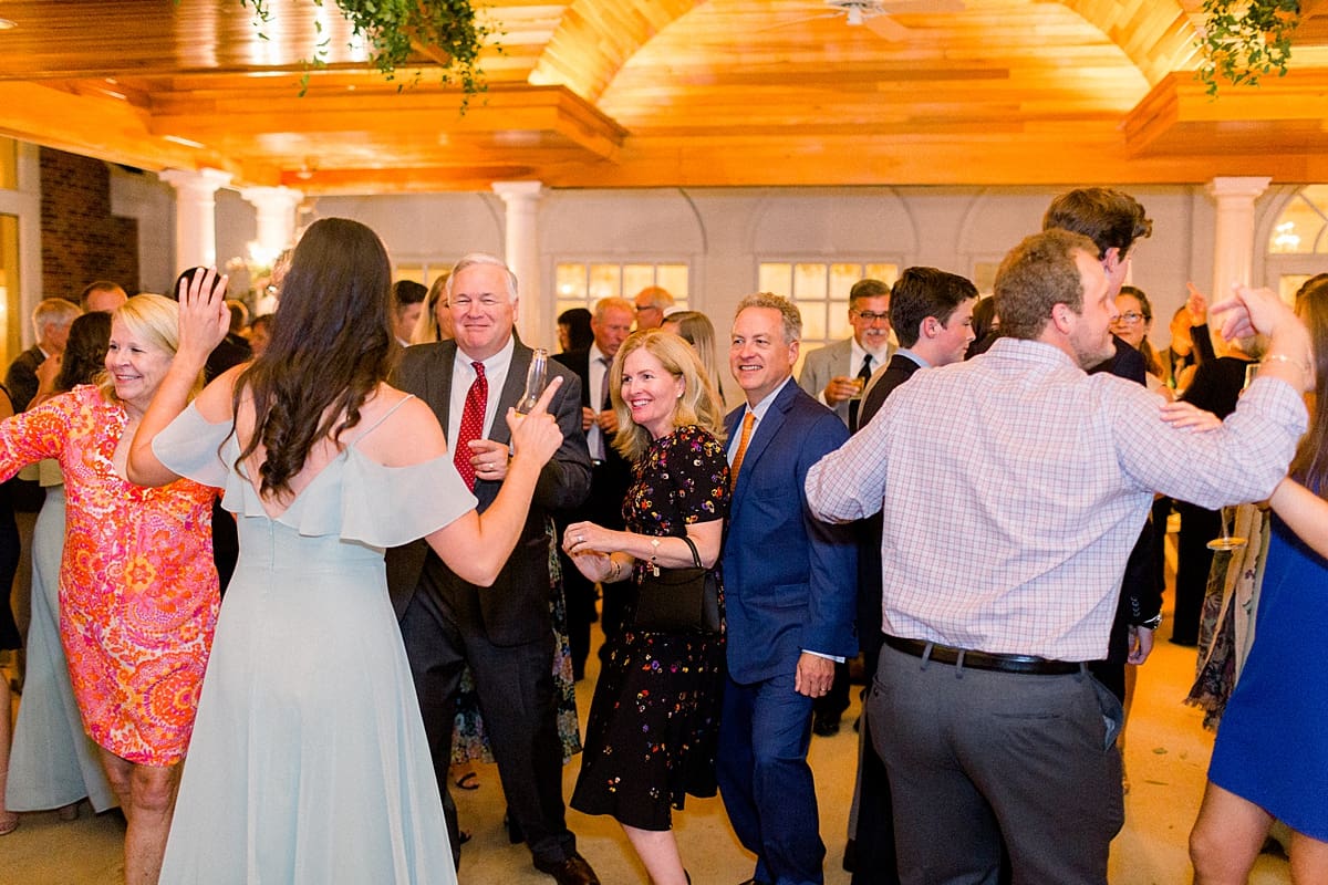 Arielle Peters Photography | Wedding guests dancing at wedding reception at Sycamore Hills Golf Club in Fort Wayne, Indiana on wedding day.