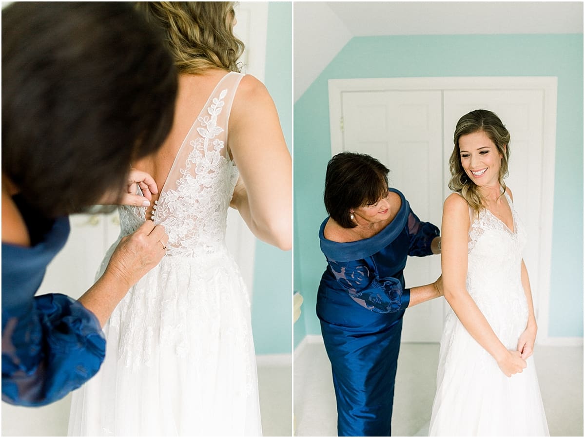 Arielle Peters Photography | Mother of the bride helping dress the bride at Sycamore Hills Golf Club in Fort Wayne, Indiana on wedding day.
