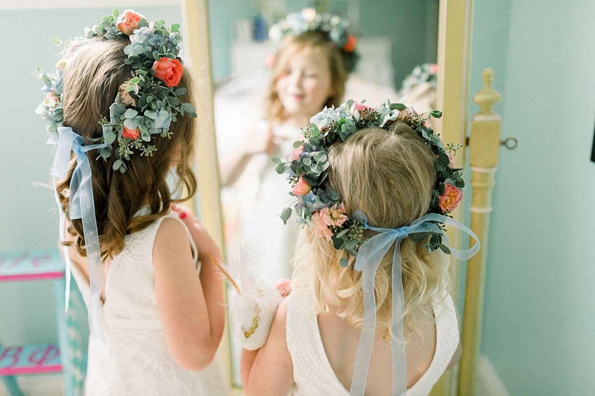 Arielle Peters Photography | Flower girls in flower crowns and dresses at Sycamore Hills Golf Club in Fort Wayne, Indiana on wedding day.