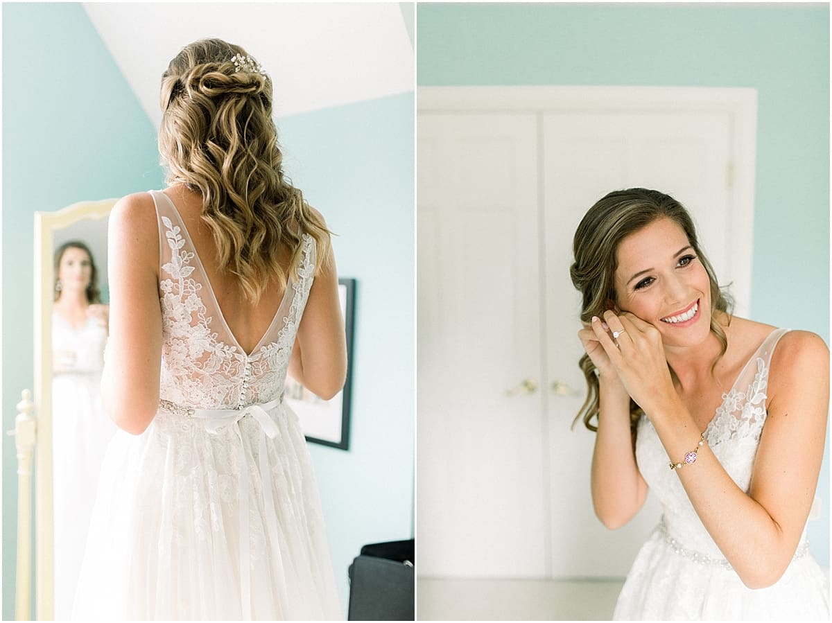 Arielle Peters Photography | Bride in wedding gown putting on wedding jewelry at Sycamore Hills Golf Club in Fort Wayne, Indiana on wedding day.