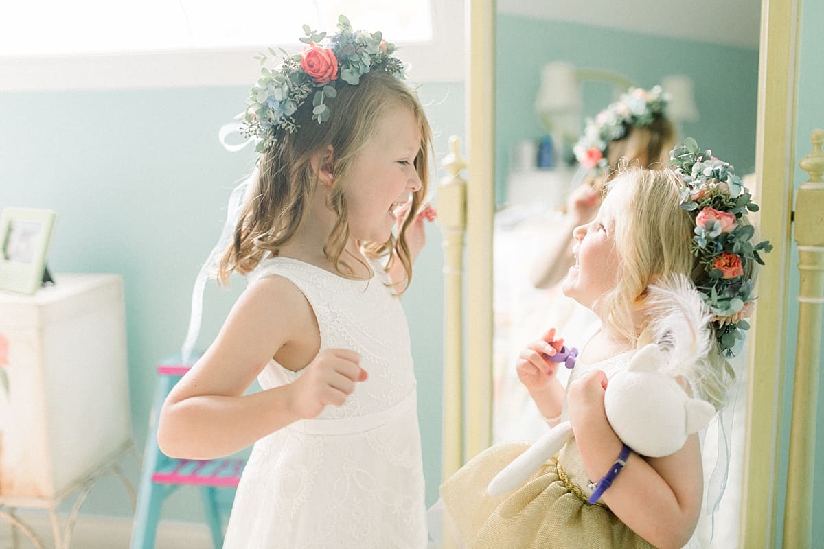 Arielle Peters Photography | Flower girls in flower crowns and dresses at Sycamore Hills Golf Club in Fort Wayne, Indiana on wedding day.