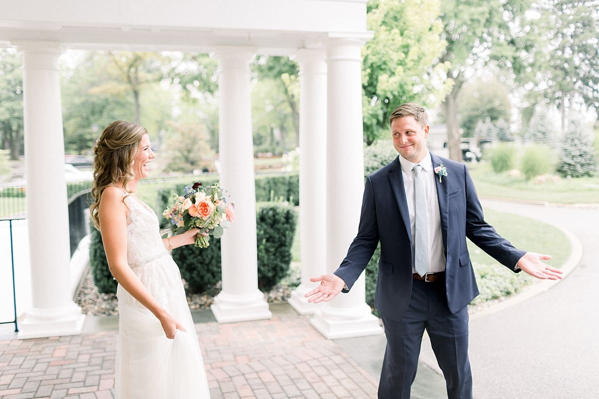 Arielle Peters Photography | Bride and groom having first reveal outside at Sycamore Hills Golf Club in Fort Wayne, Indiana on wedding day.