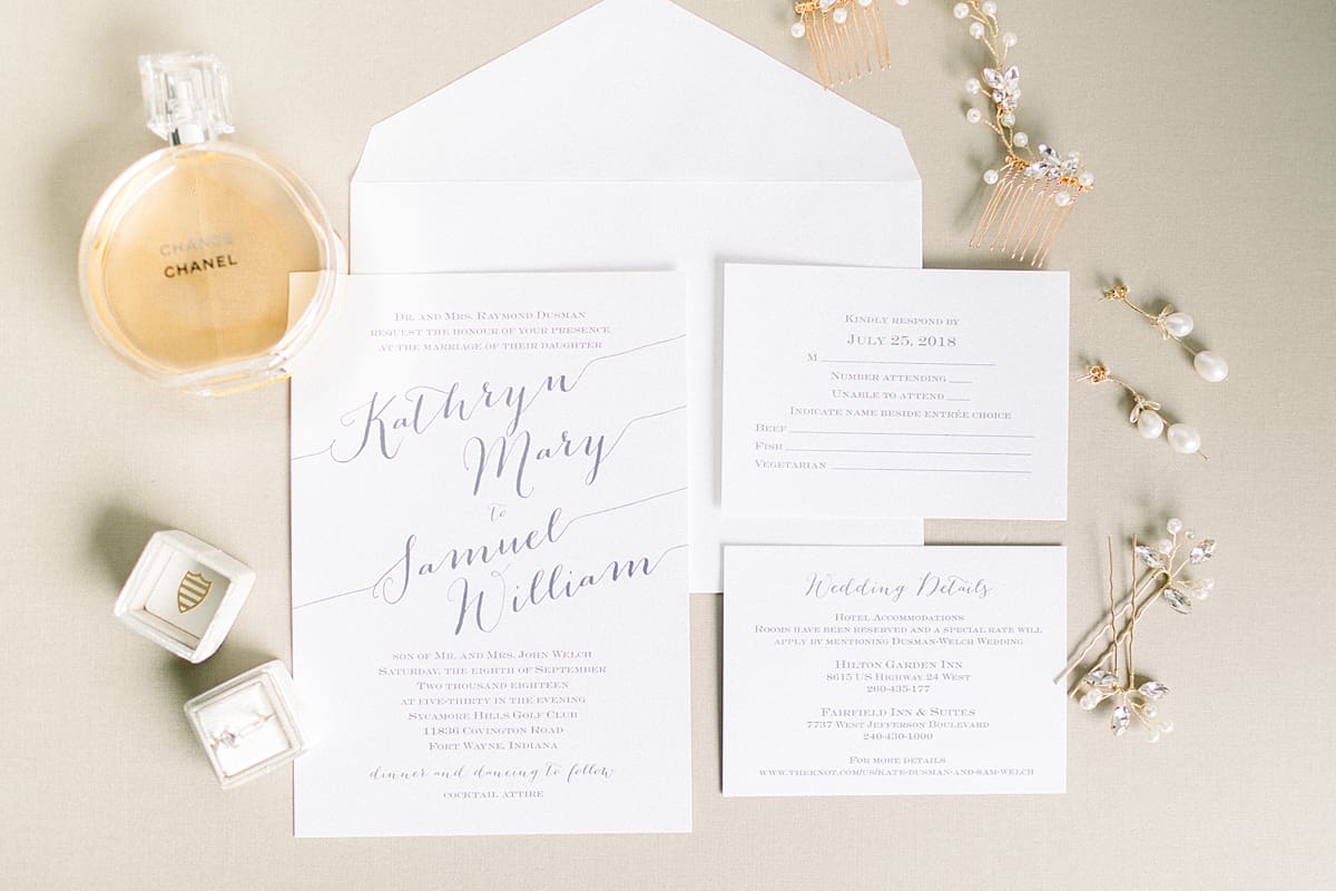 Arielle Peters Photography | Wedding invitations and accessories at Sycamore Hills Golf Club in Fort Wayne, Indiana on wedding day.