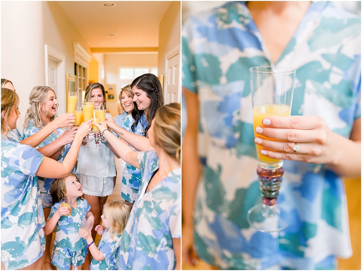 Arielle Peters Photography | Bride and bridesmaids drinking mimosas while getting ready for wedding at Sycamore Hills Golf Club in Fort Wayne, Indiana on wedding day.