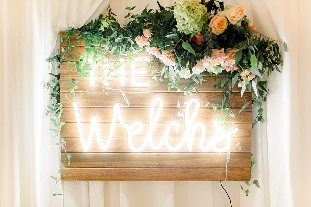 Arielle Peters Photography | Wedding reception sign and floral arrangements at Sycamore Hills Golf Club in Fort Wayne, Indiana on wedding day.
