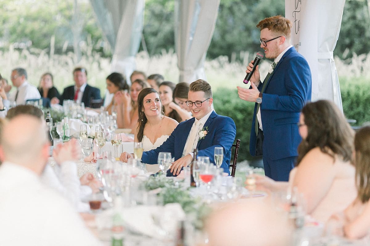 Arielle Peters Photography | Best man giving a speech at the wedding reception at The Bridgewater Club in Carmel, Indiana on wedding day.