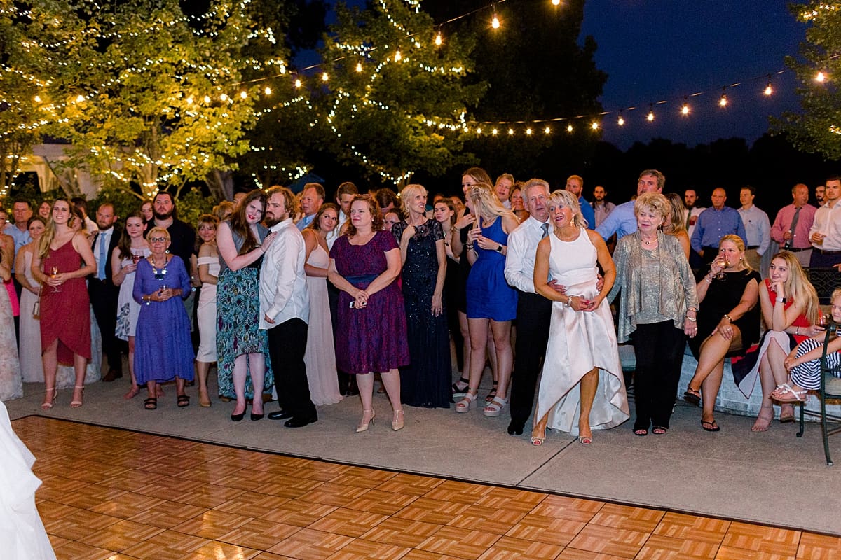 Arielle Peters Photography | Wedding guests dancing at wedding reception at The Bridgewater Club in Carmel, Indiana on wedding day.