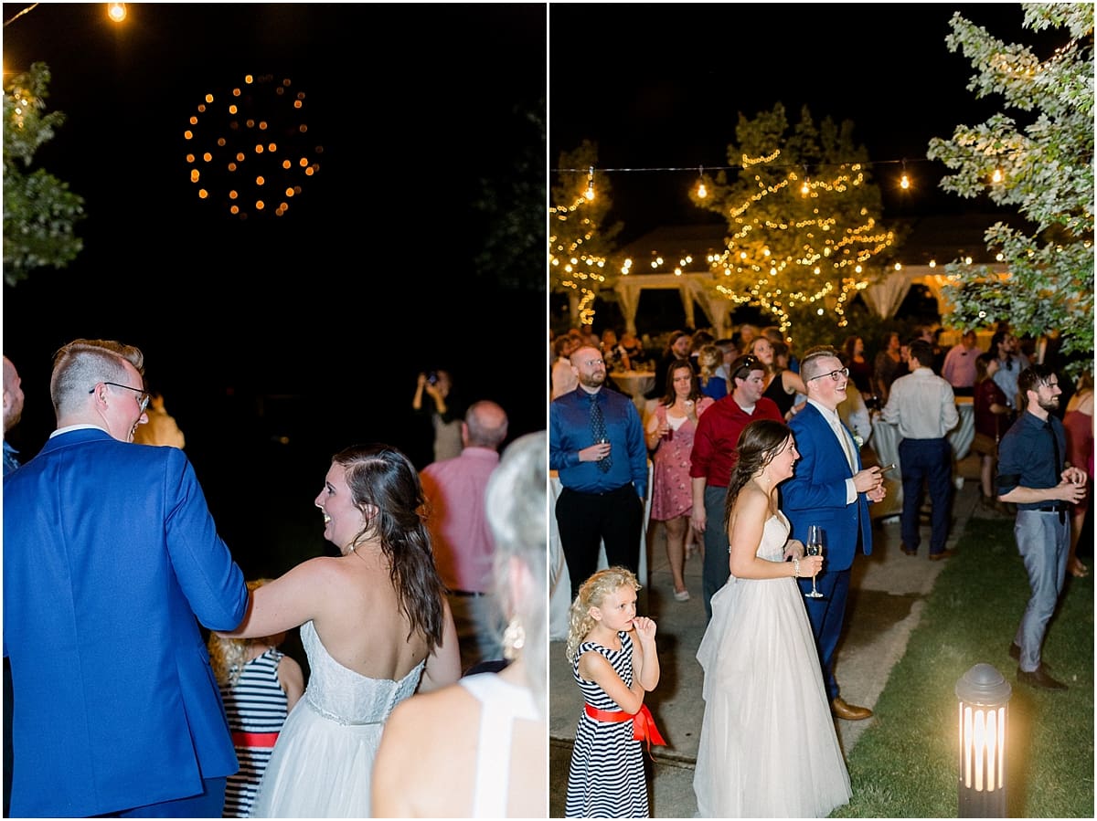 Arielle Peters Photography | Bride and groom watching fireworks at wedding reception at The Bridgewater Club in Carmel, Indiana on wedding day.
