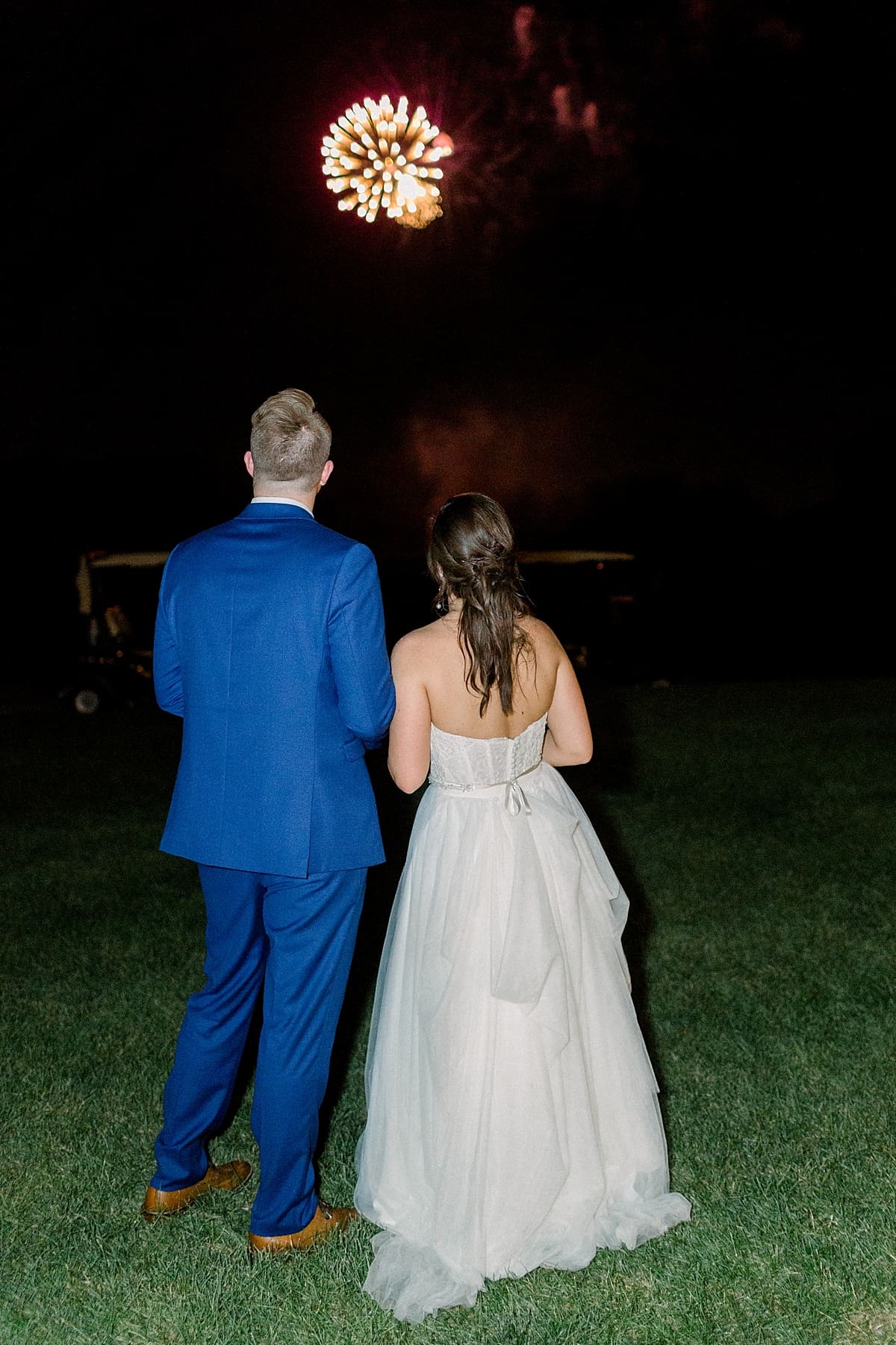 Arielle Peters Photography | Bride and groom watching fireworks at wedding reception at The Bridgewater Club in Carmel, Indiana on wedding day.
