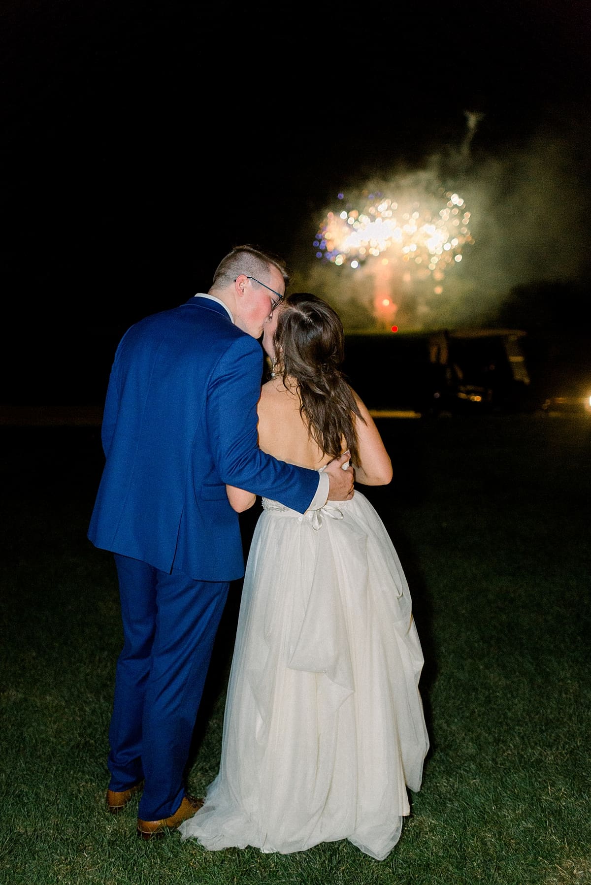 Arielle Peters Photography | Bride and groom watching fireworks at wedding reception at The Bridgewater Club in Carmel, Indiana on wedding day.
