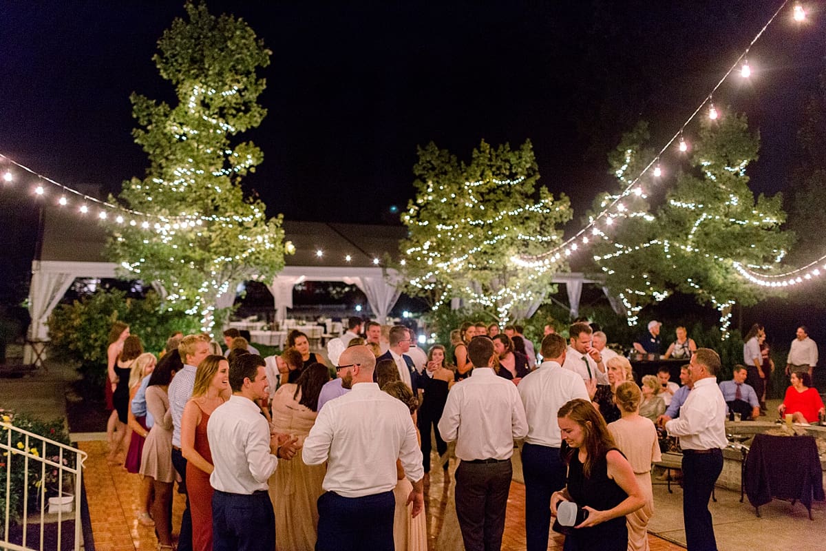 Arielle Peters Photography | Wedding guests dancing at wedding reception at The Bridgewater Club in Carmel, Indiana on wedding day.