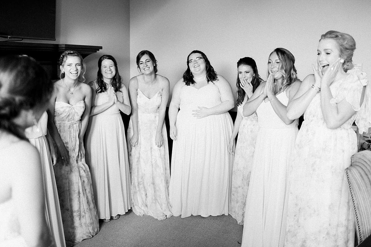 Arielle Peters Photography | Bridesmaids having first reveal of bride at The Bridgewater Club in Carmel, Indiana on wedding day.