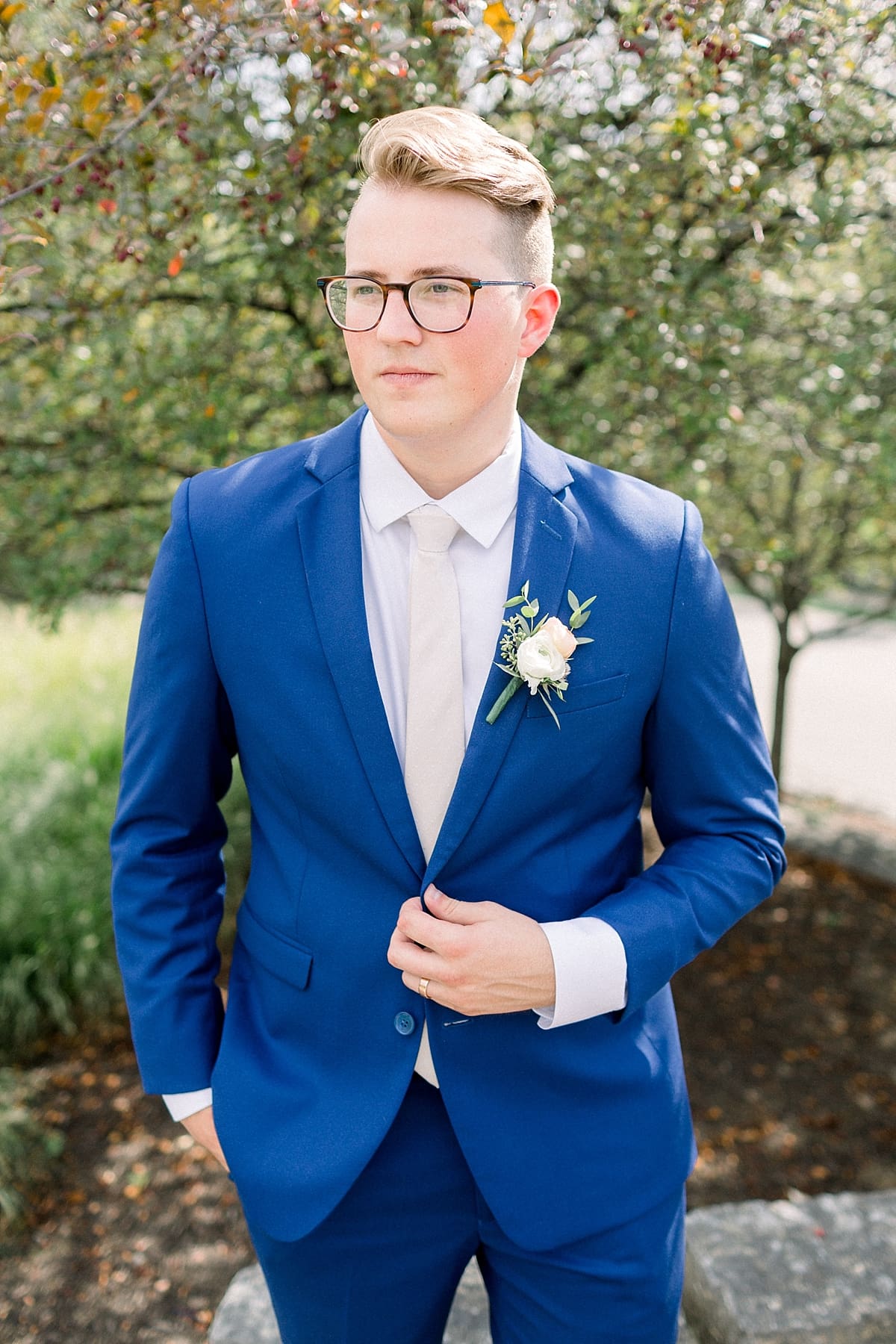Arielle Peters Photography | Groom in his tux coat outside at The Bridgewater Club in Carmel, Indiana on wedding day.