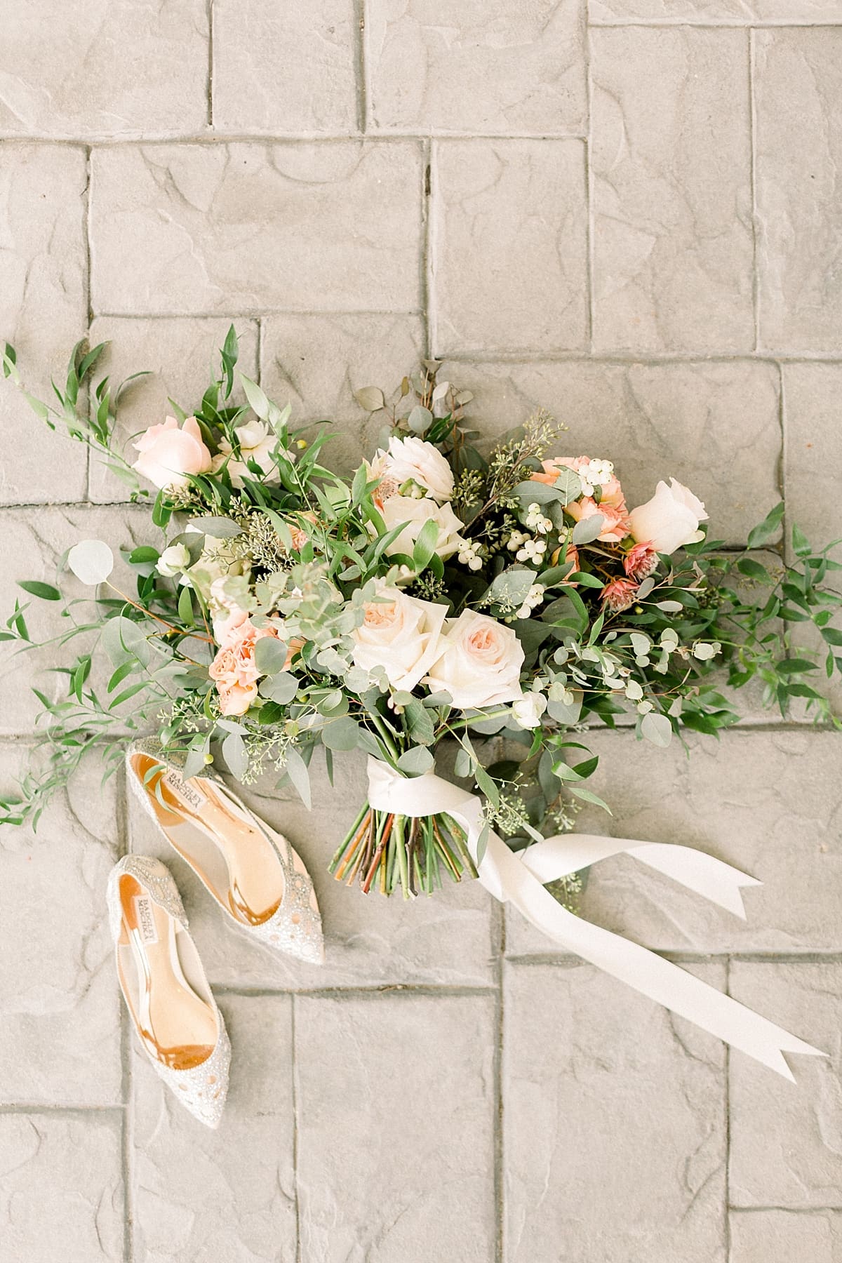 Arielle Peters Photography | Wedding bouquet and shoes at The Bridgewater Club in Carmel, Indiana on wedding day.