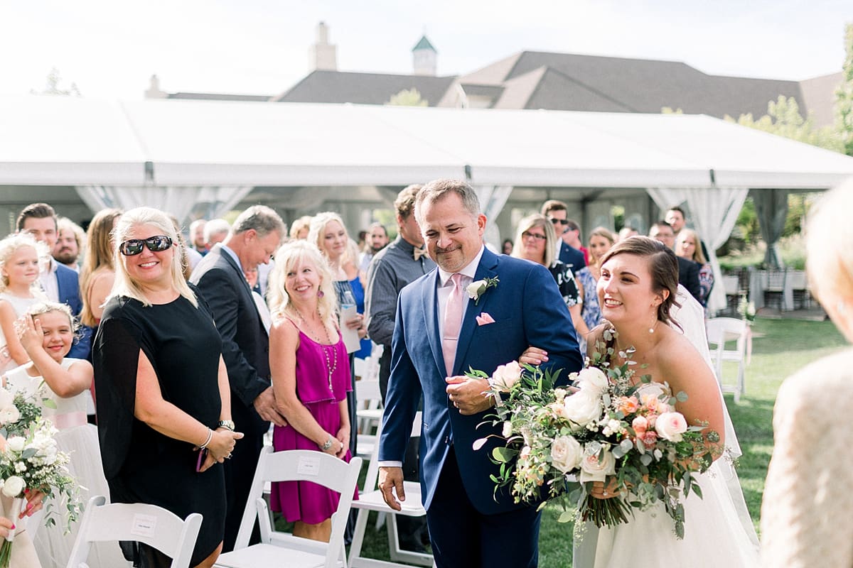 Arielle Peters Photography | Father of the bride walking the bride down the aisle at The Bridgewater Club in Carmel, Indiana on wedding day.