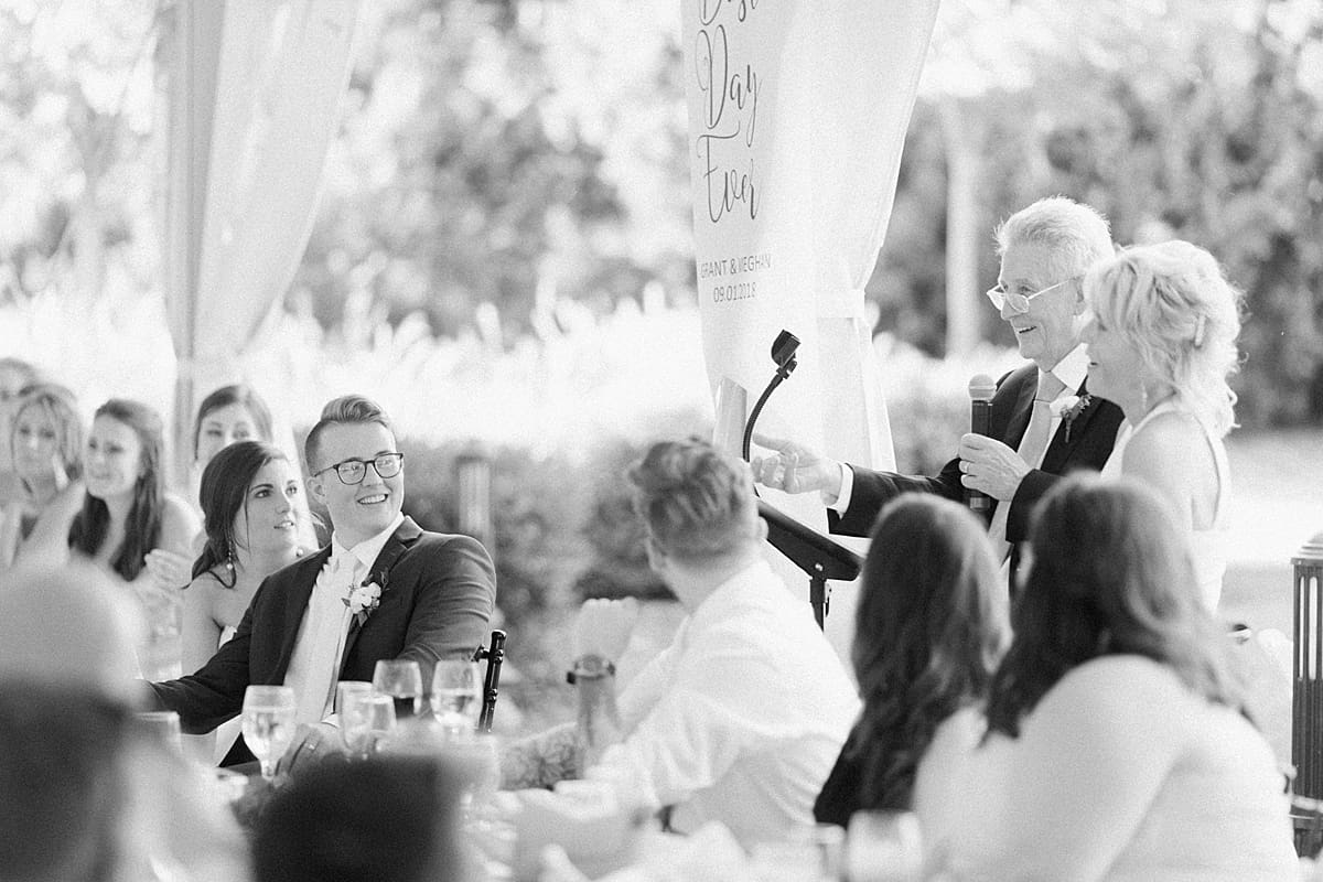Arielle Peters Photography | Parents giving a speech at the reception at The Bridgewater Club in Carmel, Indiana on wedding day.