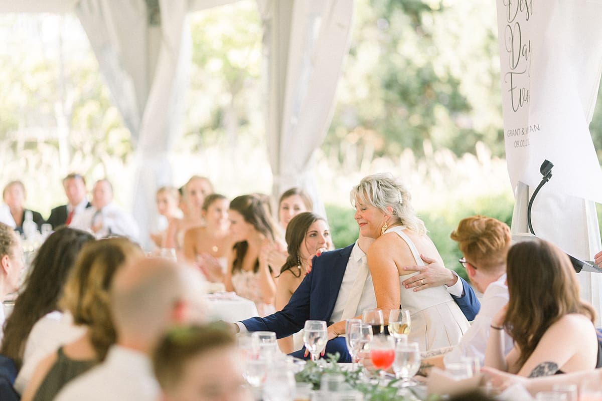 Arielle Peters Photography | Parents giving a speech at the wedding reception at The Bridgewater Club in Carmel, Indiana on wedding day.
