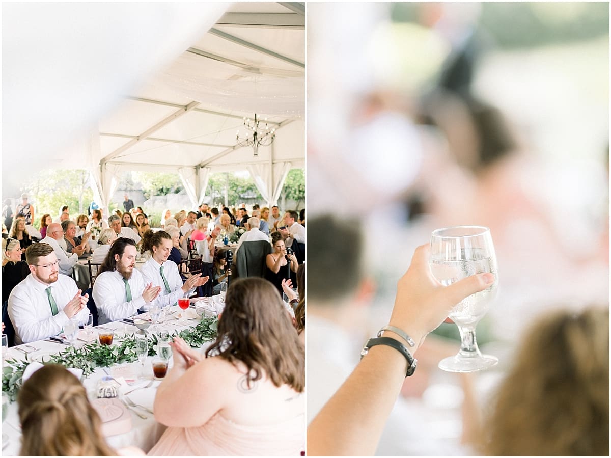 Arielle Peters Photography | Wedding guests raising a glass at the wedding reception at The Bridgewater Club in Carmel, Indiana on wedding day.