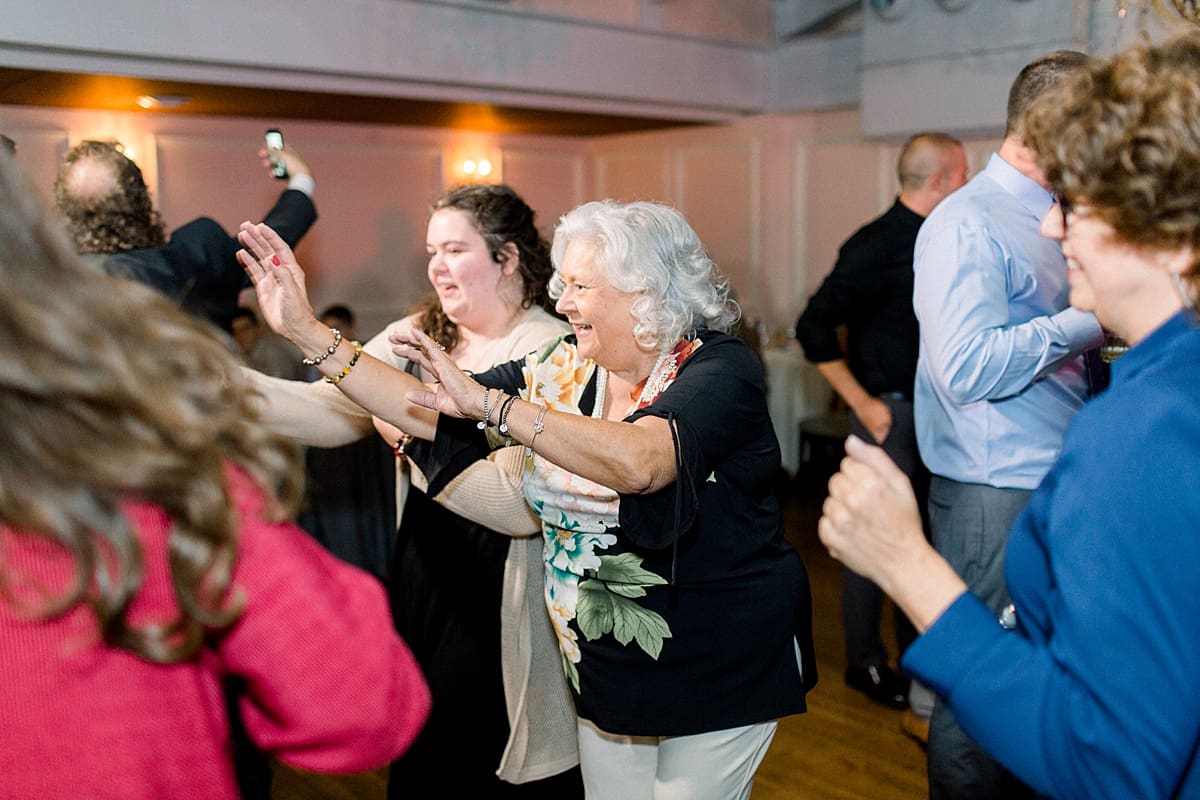 Arielle Peters Photography | Wedding guests dancing at wedding reception at The Madison Club in Madison, Wisconsin.