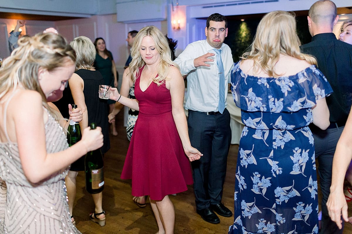 Arielle Peters Photography | Wedding guests dancing at wedding reception at The Madison Club in Madison, Wisconsin.