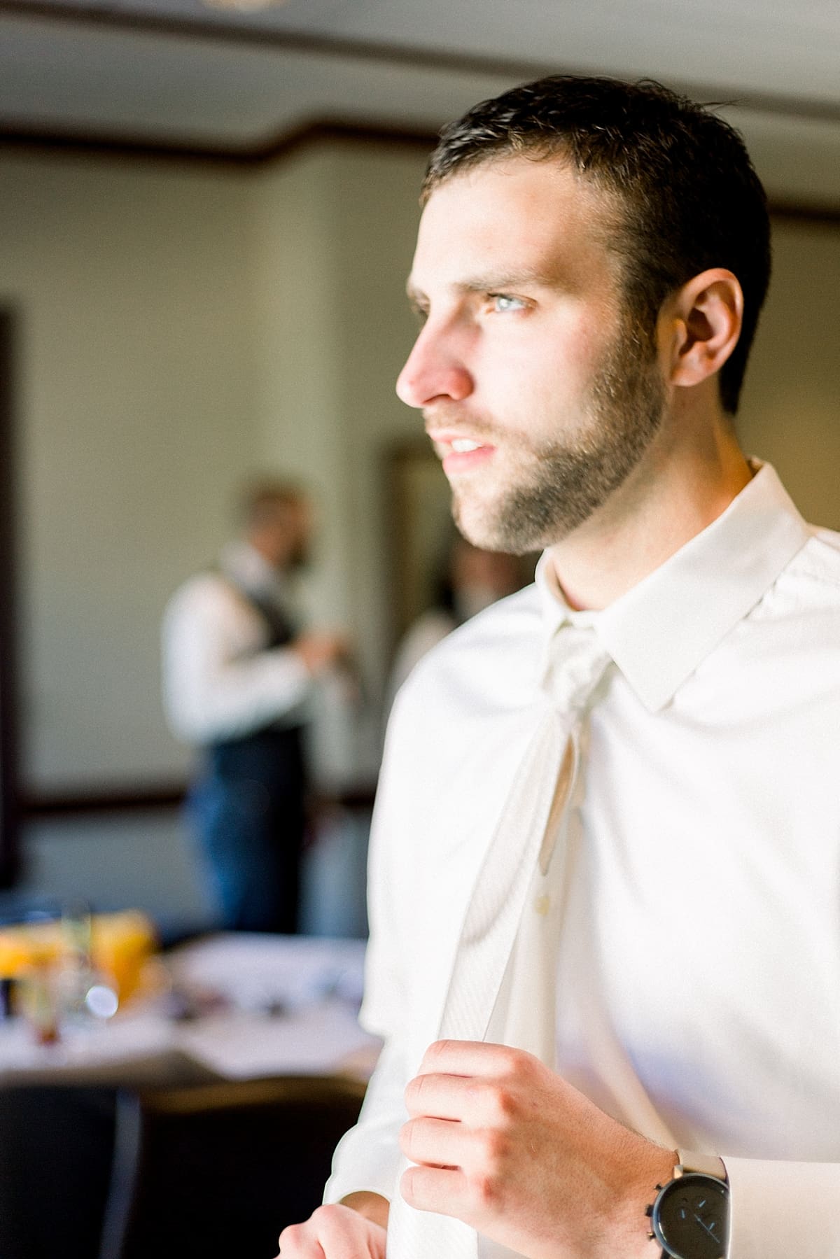 Arielle Peters Photography | Groom getting ready on wedding day in Madison, Wisconsin. 
