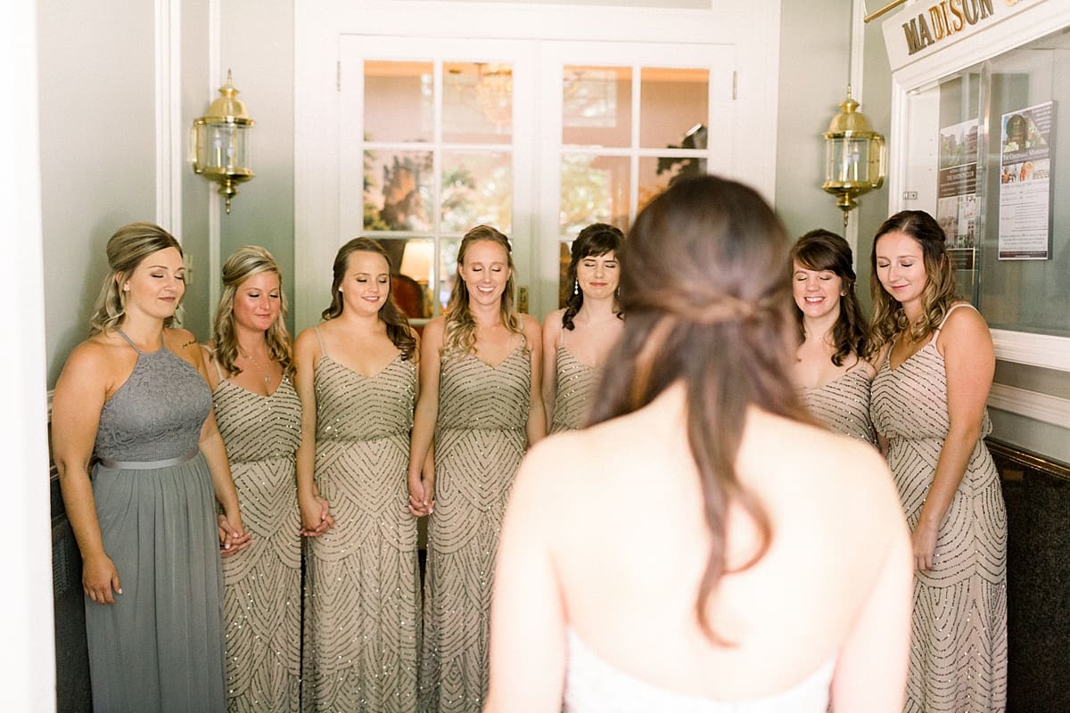 Arielle Peters Photography | Bridesmaids seeing bride in her wedding dress in Madison, Wisconsin on wedding day.