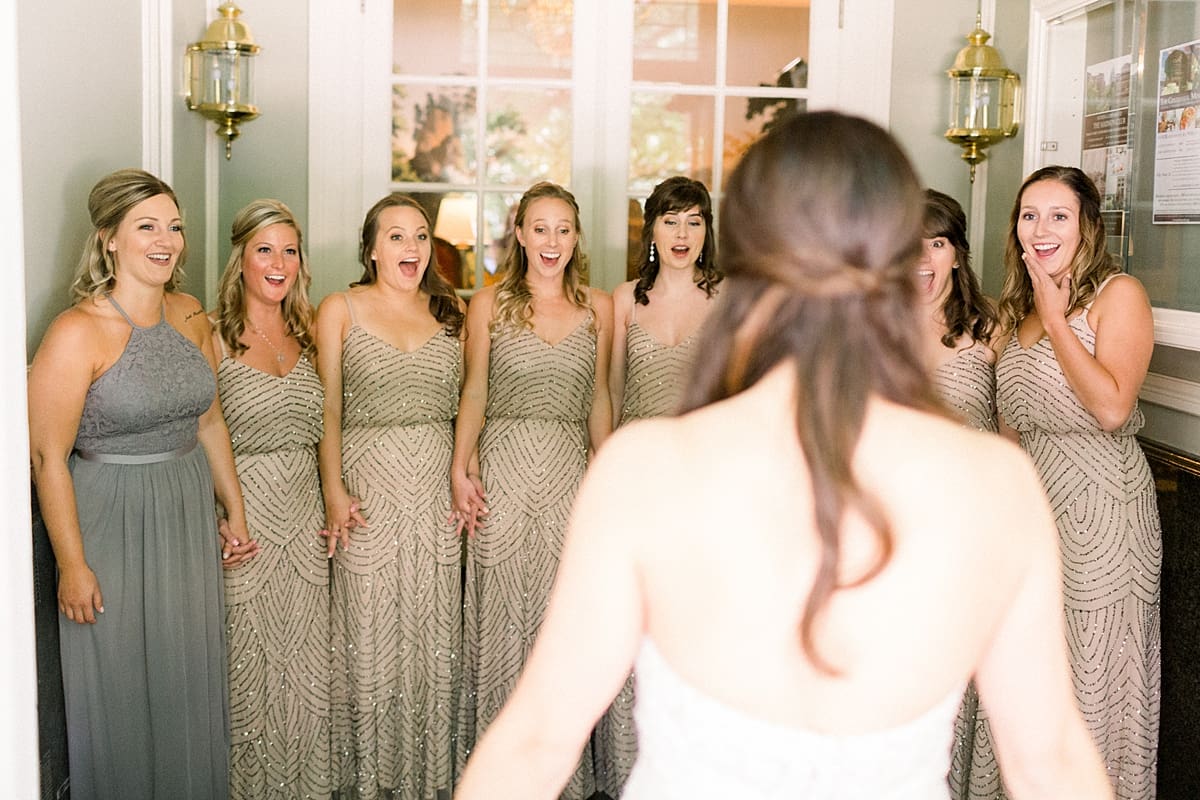 Arielle Peters Photography | Bridesmaids seeing bride in her wedding dress in Madison, Wisconsin on wedding day.