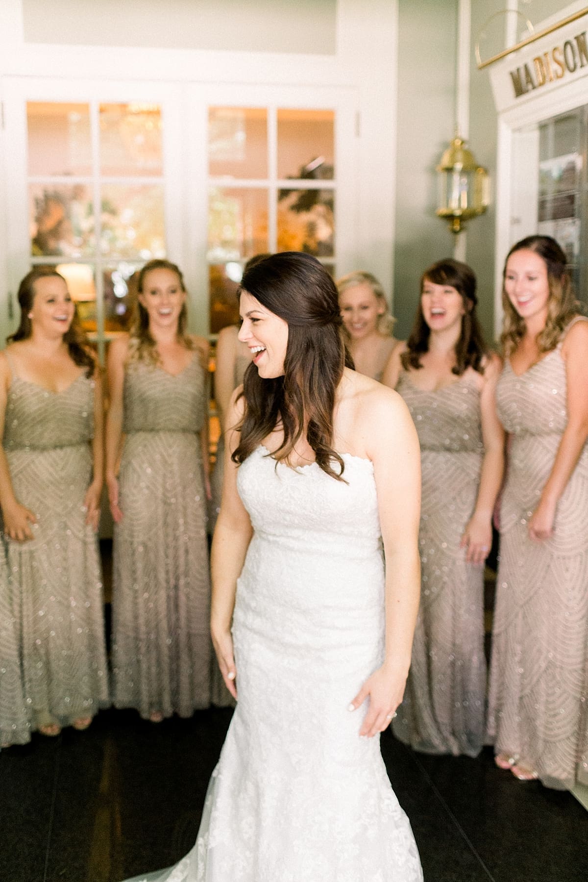 Arielle Peters Photography | Bridesmaids seeing bride in wedding dress in Madison, Wisconsin on wedding day.