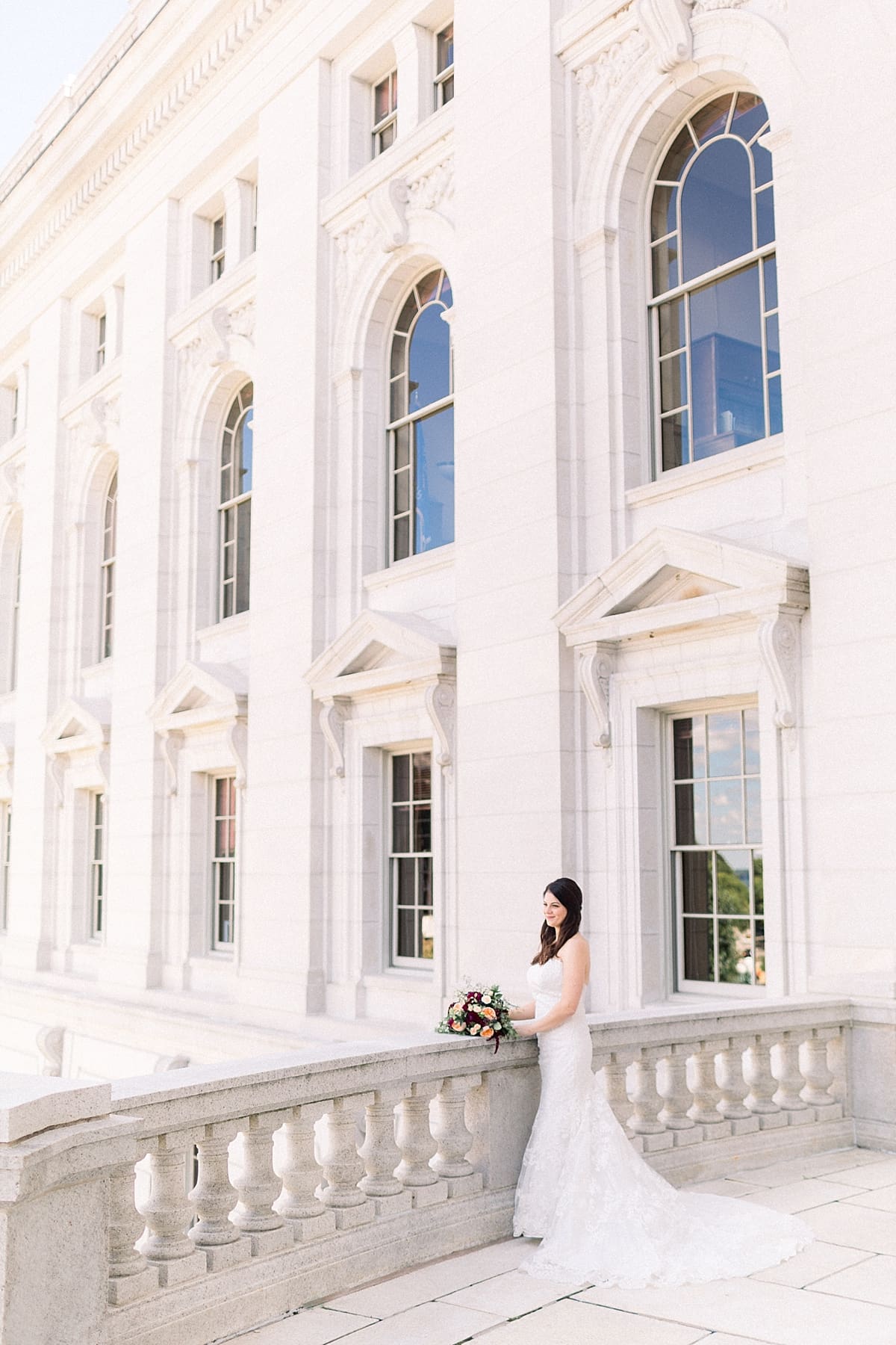 Arielle Peters Photography | Bride standing at terrace at Monona Terrace on wedding day in Madison, Wisconsin.