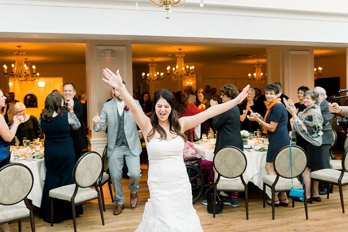 Arielle Peters Photography | Bride dancing inside the Madison Club during wedding reception in Madison, Wisconsin on wedding day.