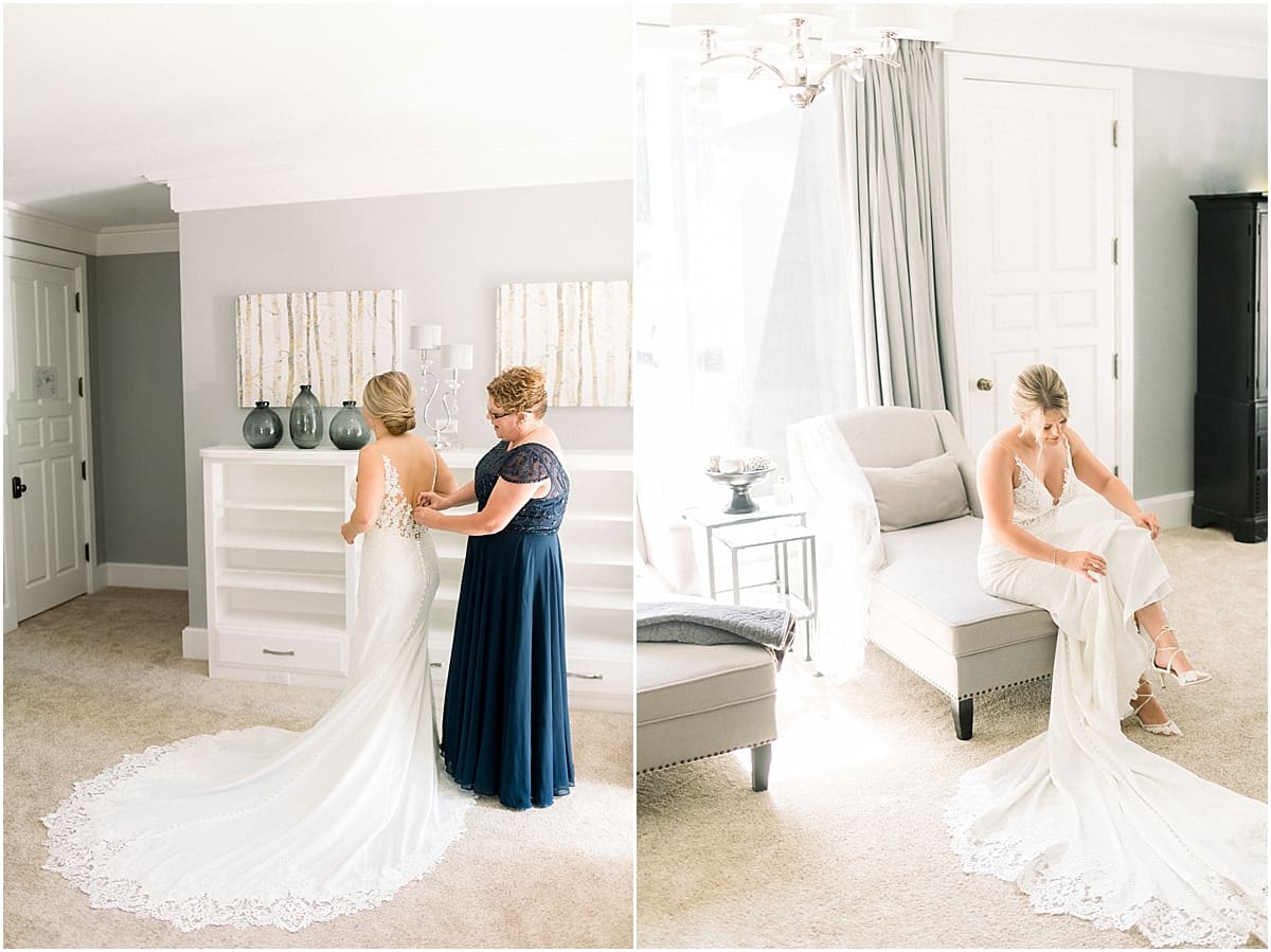 Arielle Peters Photography | Mother of the bride helping the bride put on her wedding dress at The Morris Estate in Niles, Michigan on wedding day. 