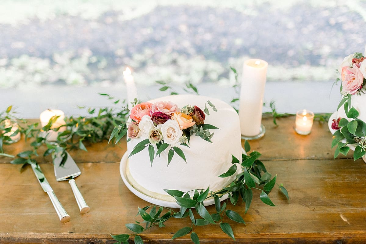 Arielle Peters Photography | Wedding cake and floral arrangements at The Morris Estate in Niles, Michigan on wedding day.  