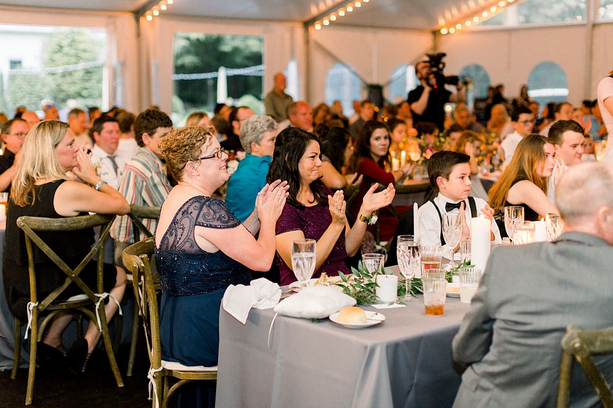 Arielle Peters Photography | Wedding guests clapping at wedding reception at The Morris Estate in Niles, Michigan on wedding day.  